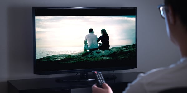 person-watching-television-tv